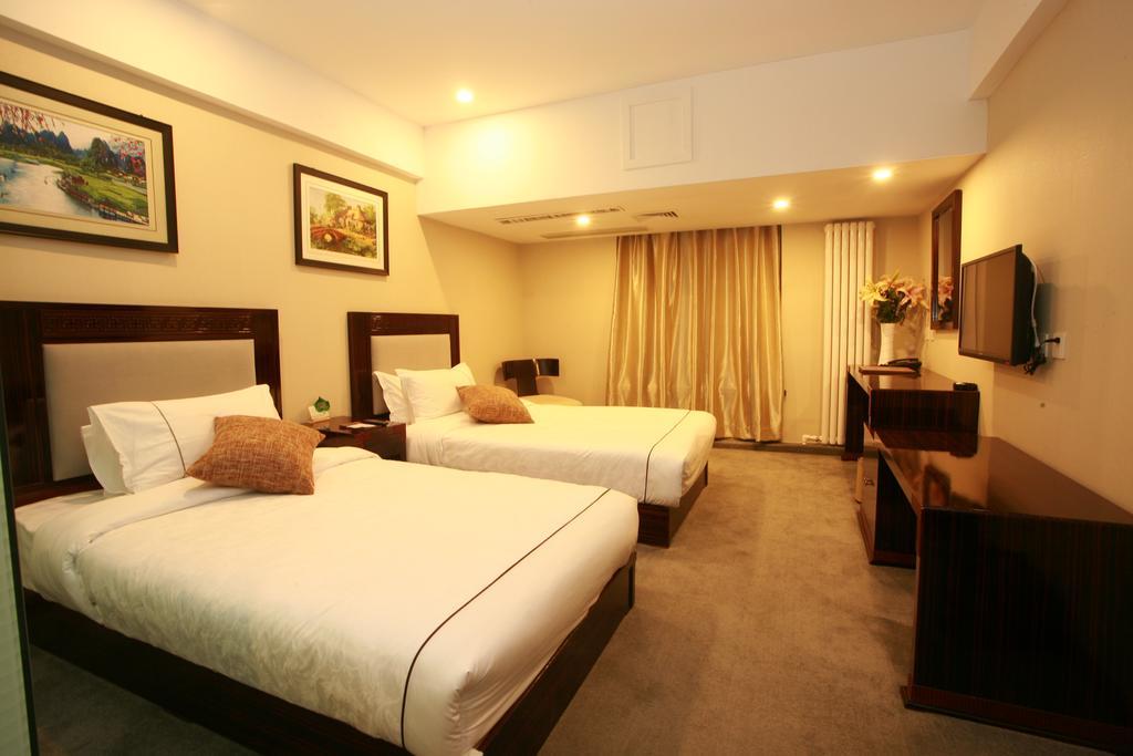 Harbin Yakelai Holiday Hotel חדר תמונה