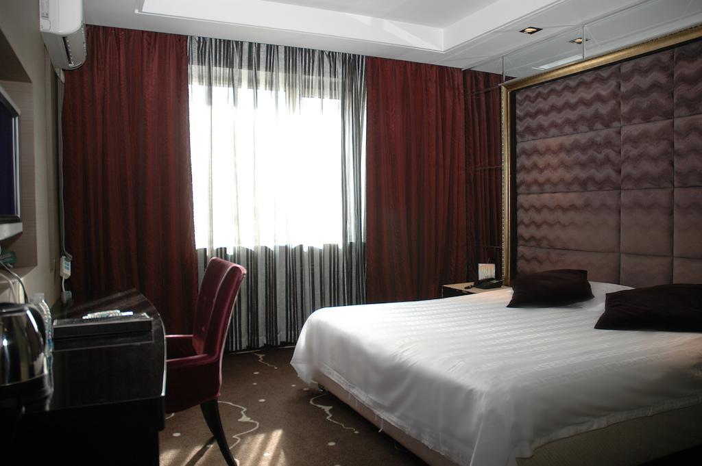 Harbin Yakelai Holiday Hotel חדר תמונה