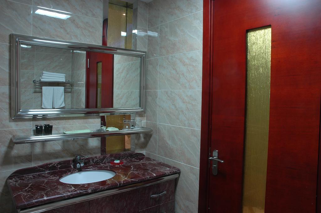 Harbin Yakelai Holiday Hotel חדר תמונה