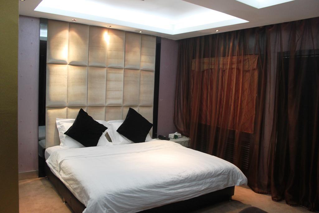Harbin Yakelai Holiday Hotel חדר תמונה